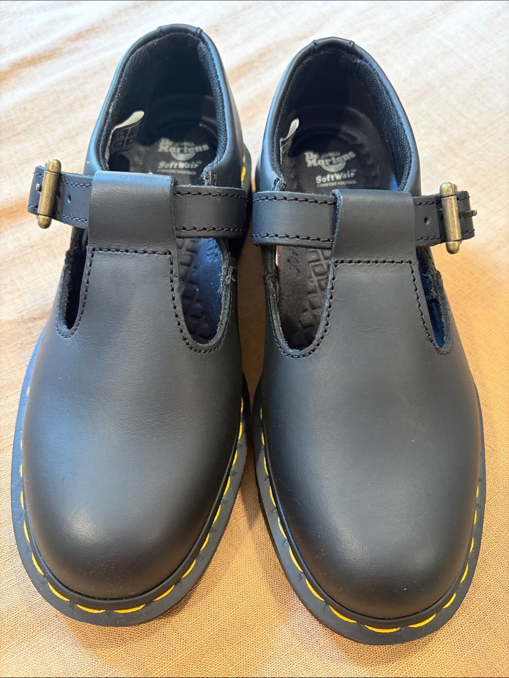 Dr. Martens Black Leather T-Strap Flats with Yellow Stitching